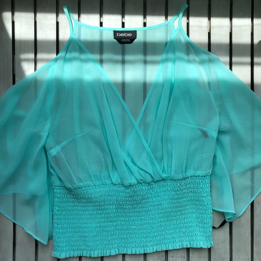 Bebe light blue dressy shoulder top